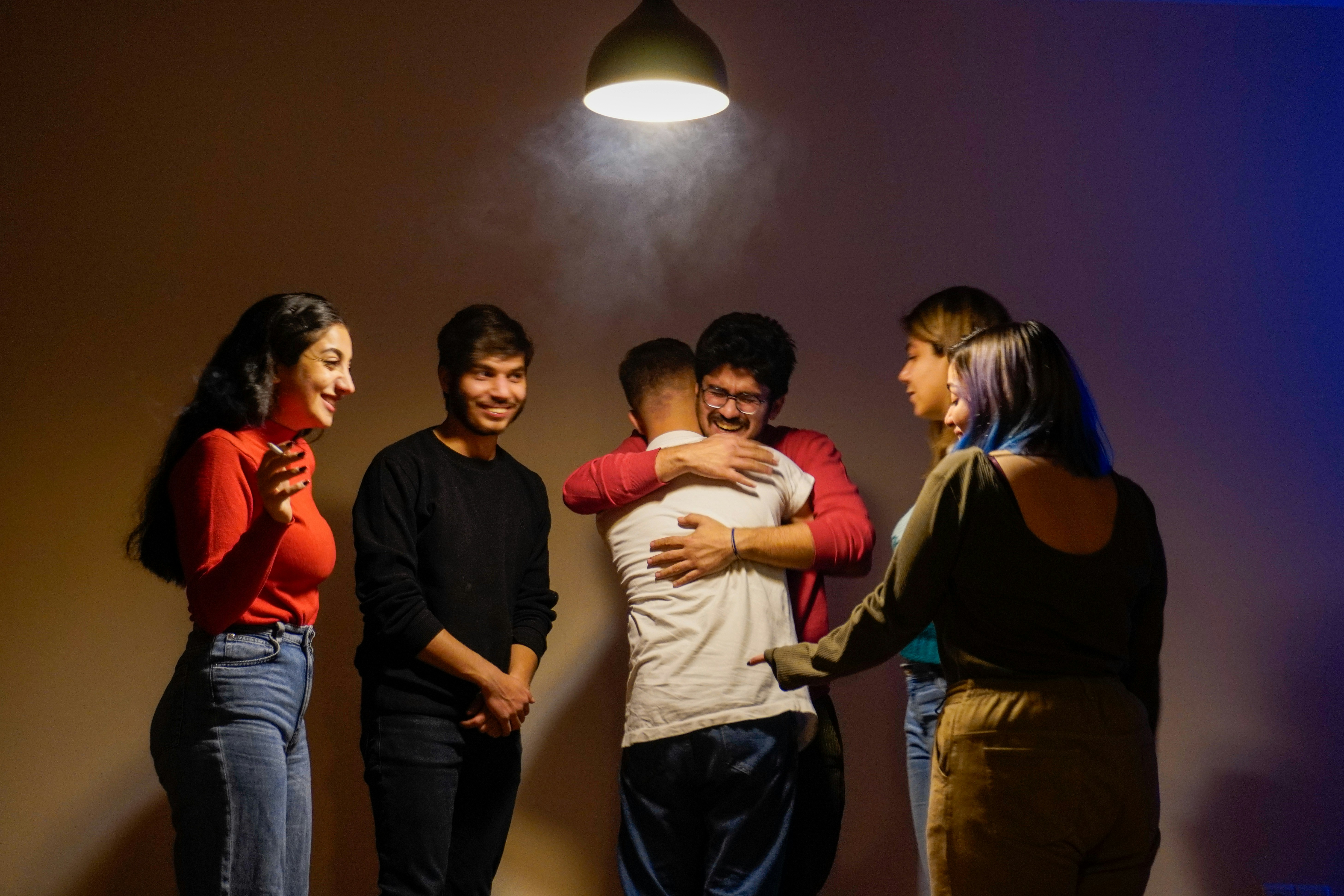 Friends laughing together at a party